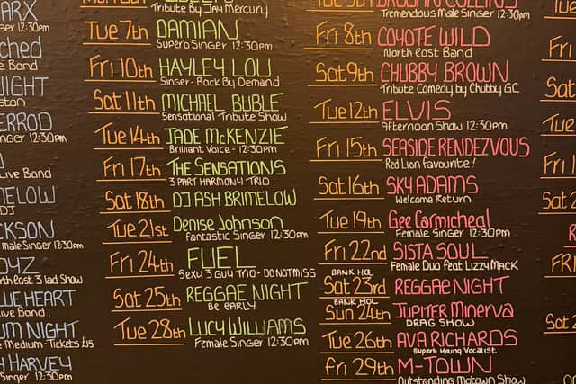 Entertainment is listed on a board for the next few months.