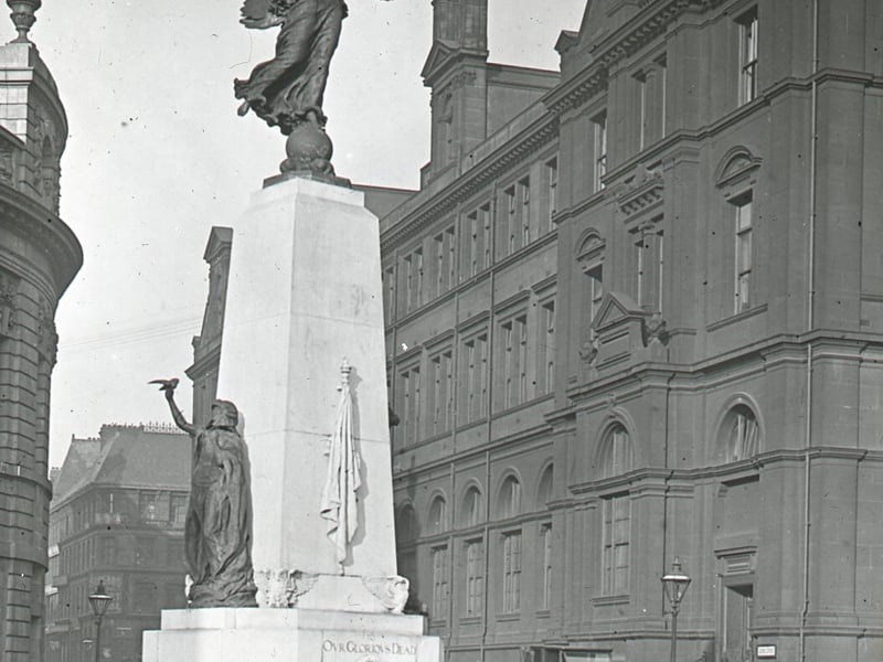 The War Memorial in its original location, next to the Majestic cinema and Post Office in City Square.