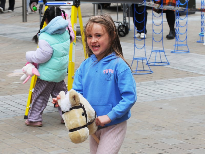 Grace Auster, five, of Leeds on the hobbyhorse.