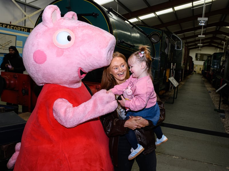 Someone is delighted to meet Peppa!