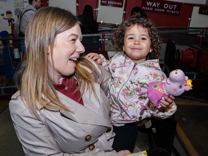 A happy little one after meeting Peppa