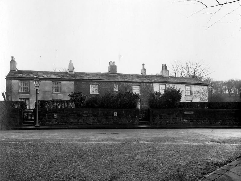 A row of cottages on Morris Lane named Hark To Rover pictured in December 1935.