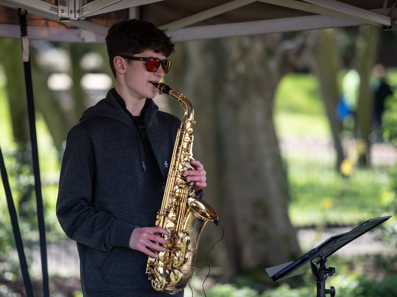 A saxophonist entertains the crowds at the Kirkham Spring Festival.
