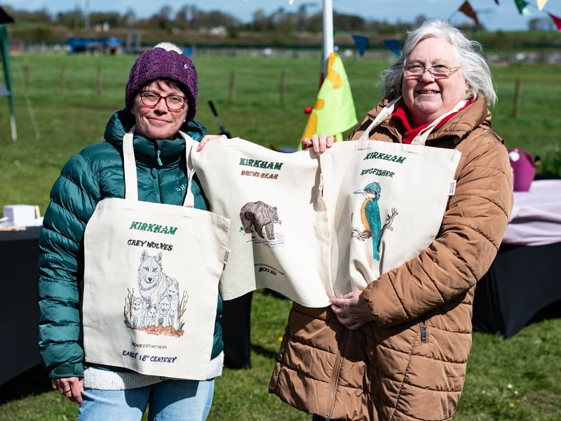 Emma Thraves-Ferguson, of Kirkham in Bloom, and Annette York, of Kirkham Cultural Connections, with painted bags on their stall.