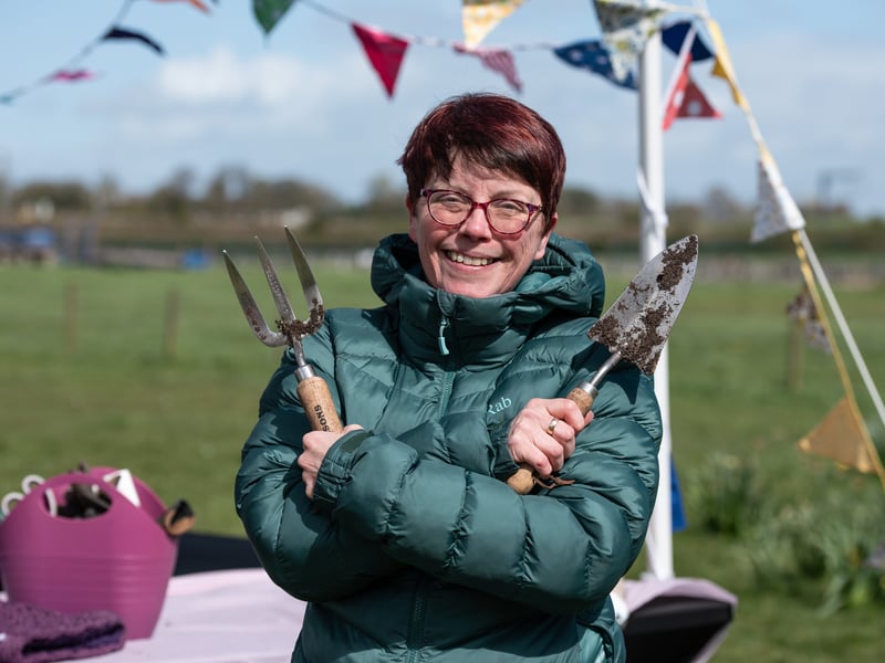Emma Thraves-Ferguson, of Kirkham in Bloom, hands out free sunflower seeds.