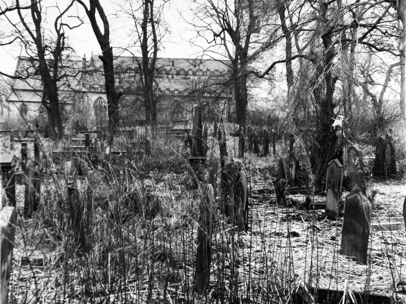 Holy Trinity churchyard pictured in January 1969. The graves were overgrown and many of the gravestones had sunk as much as 3ft.