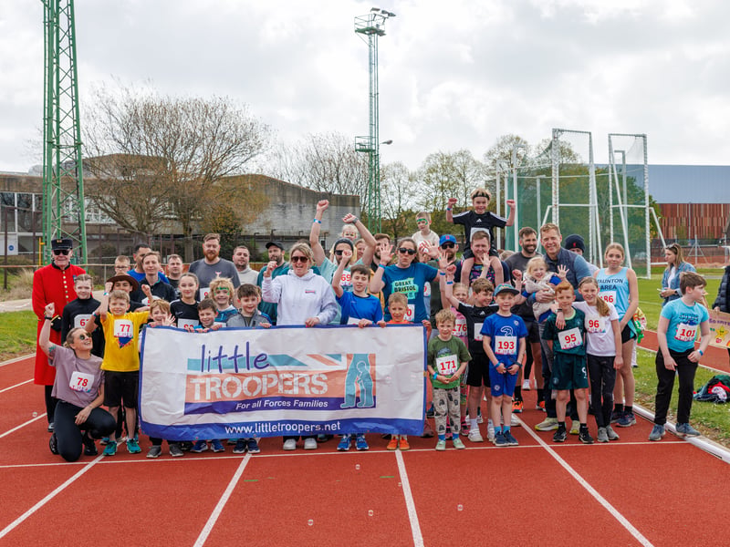 The military children’s charity Little Troopers organised a fun run day at HMS Temeraire to celebrate the month of the military child. Pictured: Families and children before the 3K run.