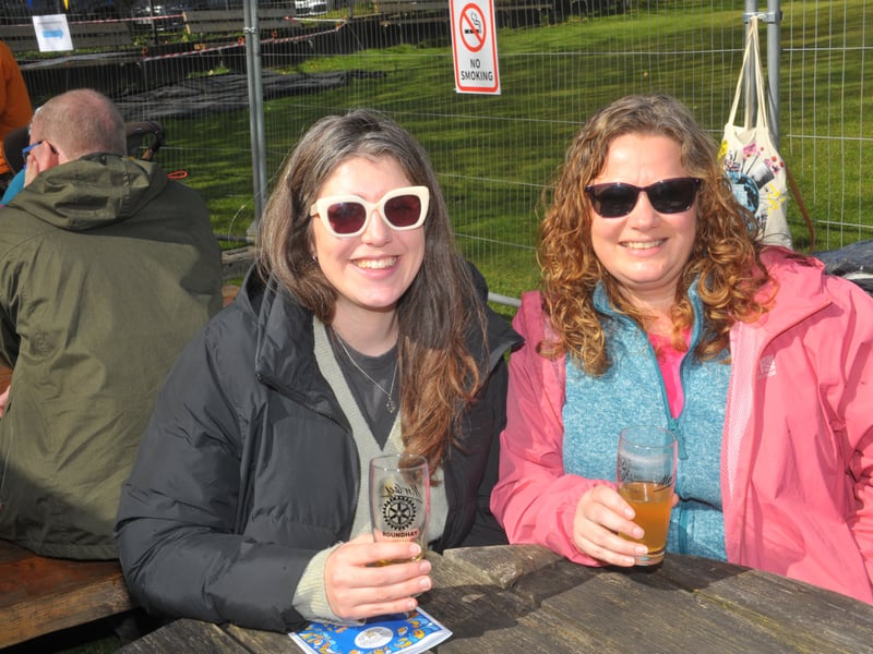  Emma Lewis and Marie Egan enjoy a drink and the sunshine.