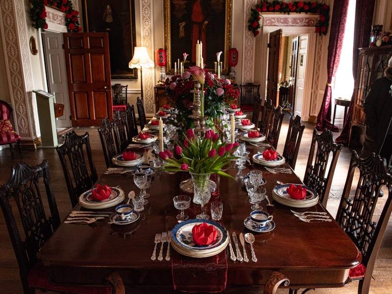 The spectacular dining room is adorned with oriental flowers and artistic displays, as part of the Lytham Hall flower festival. 