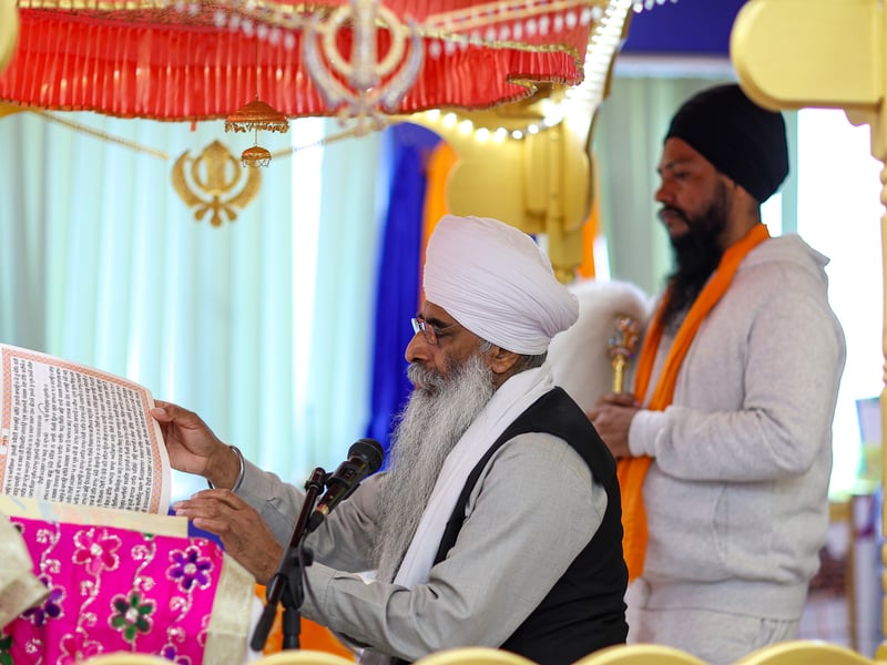 Reciting from scriptures.
