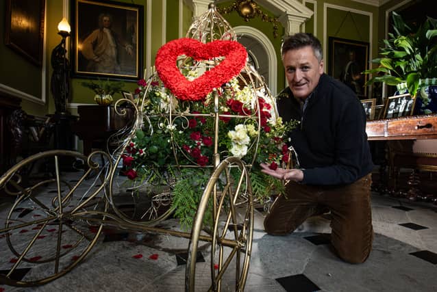 Lytham Hall manager Peter Anthony with a spectacular floral display which he created as part of the annual Flower Festival.