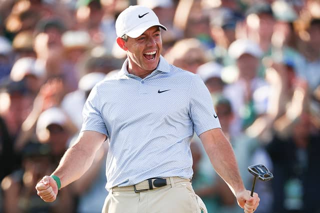 Rory McIlroy of Northern Ireland celebrates winning the 2026 Masters Tournament.