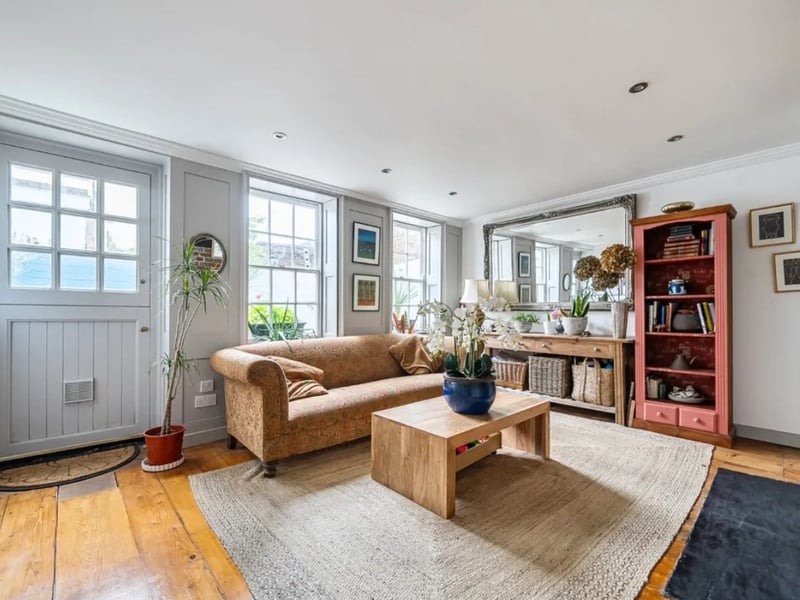 Inside Old Portsmouth's distinctive blue house which has hit the market for £750,000.
