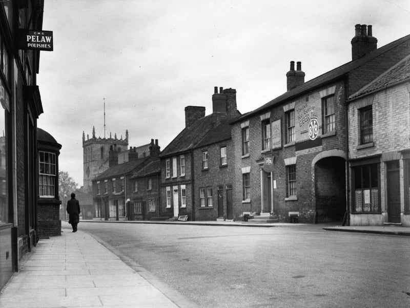 Snaith, in the East Riding of Yorkshire, pictured in May 1950, showing the market place and St Laurence Priory