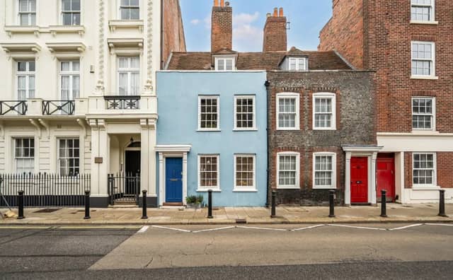 Inside Old Portsmouth's distinctive blue house which has hit the market for £750,000.