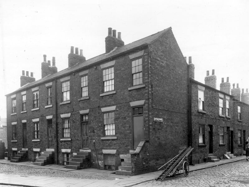 On the left of this view are four houses which are part of Cobden's Buildings in April 1959.