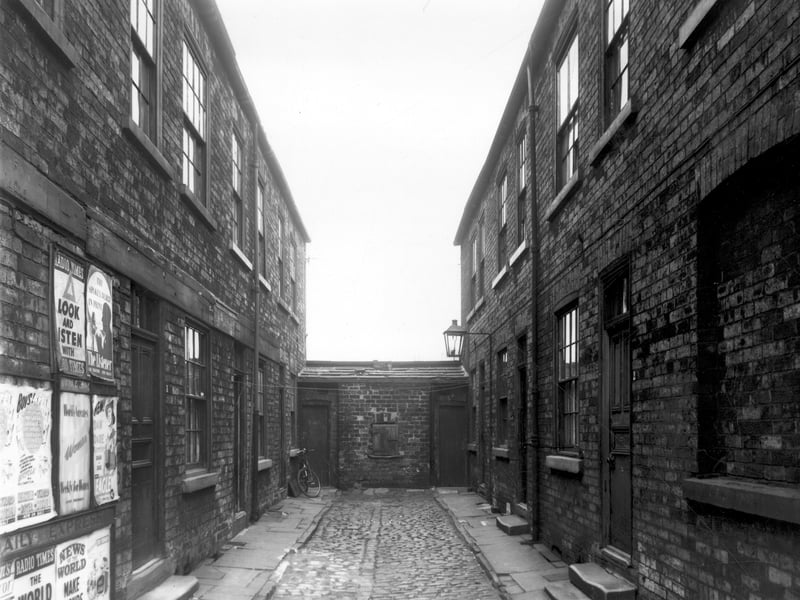 This view looks from Elland Road onto 6 houses on Burniston Place in April 1959.