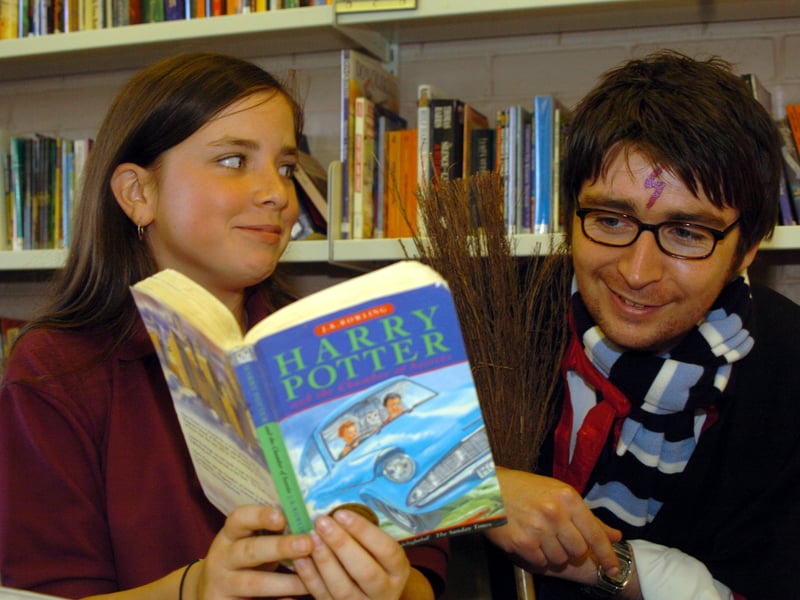 Book Week comes alive at Farnley Park High School in October 2004. Pupil Genevieve Goff is pictured with teacher Matt Cullen as Harry Potter.
