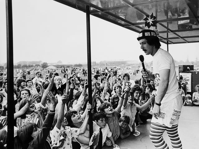 A busy scene from the Wrekin and Telford Youth Rally at Bennetts Bank, Wellington, on July 9, 1977, where young people gathered for a day of sport and fun including football, netball, hockey and “It’s A Knockout”. Beacon Radio’s mobile unit was also on site, capturing the lively atmosphere of this second annual youth event.