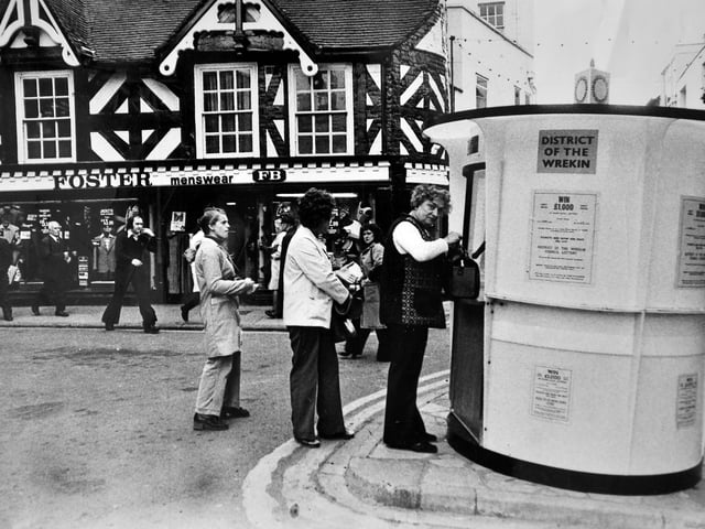 People queueing in Wellington town centre on September 29, 1977, to buy lottery tickets from Wrekin District Council’s travelling kiosk in The Square. The council-run lottery was launched to raise funds for social and recreational facilities across the district, drawing steady interest from locals in this snapshot of 1970s community life.