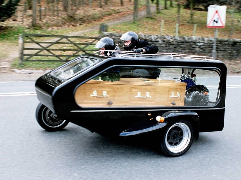 March 2004 and motorcycle mad Dennis Lloyd was transported to his funeral on a special sidecar Hearse
