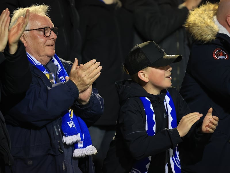 Brilliant photos of jubilant Pompey faithful celebrating triumph over Ipswich Town under the lights at Fratton.