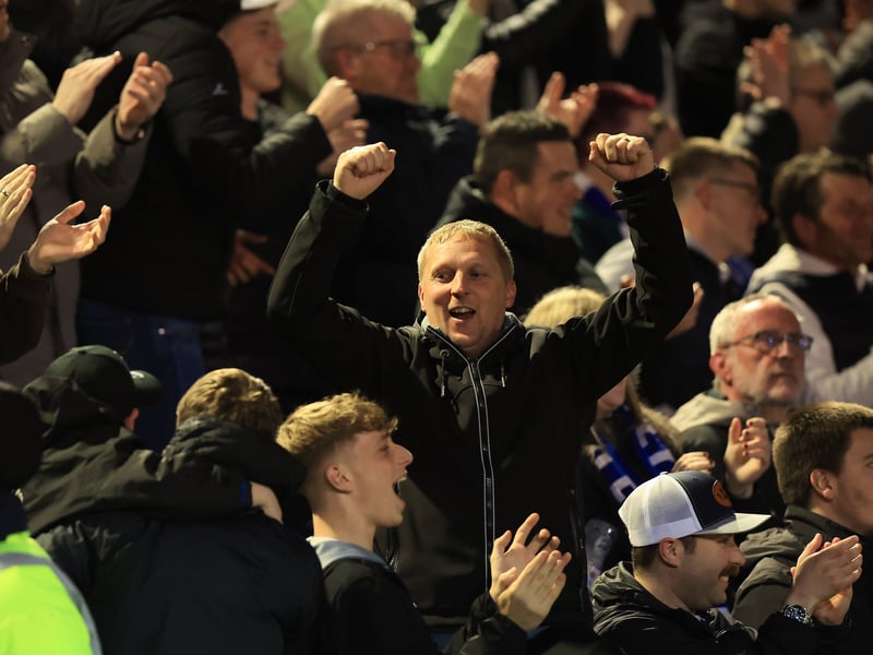 Brilliant photos of jubilant Pompey faithful celebrating triumph over Ipswich Town under the lights at Fratton.