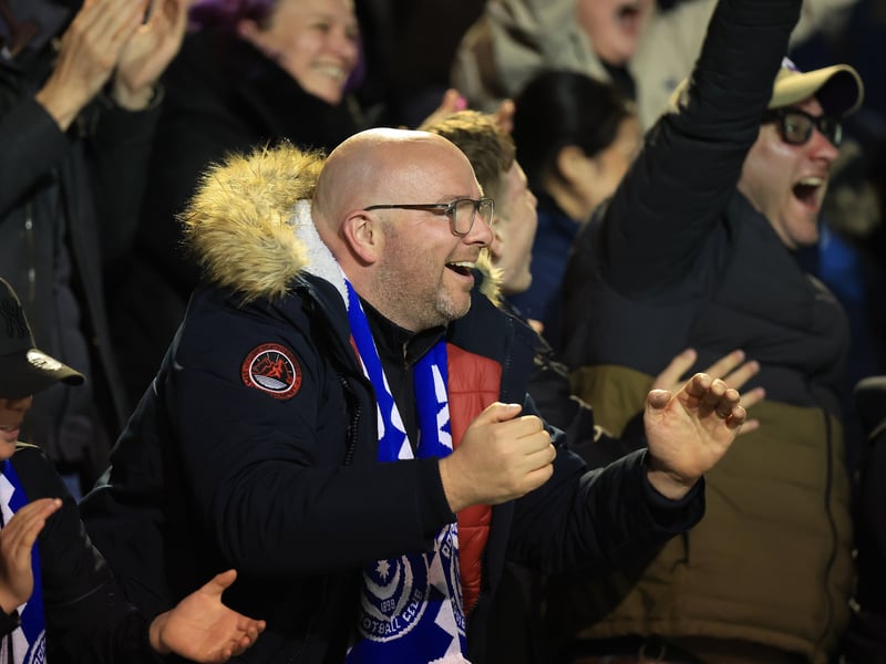 Brilliant photos of jubilant Pompey faithful celebrating triumph over Ipswich Town under the lights at Fratton.