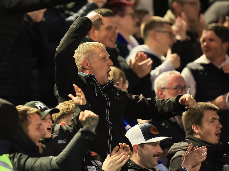 Brilliant photos of jubilant Pompey faithful celebrating triumph over Ipswich Town under the lights at Fratton.