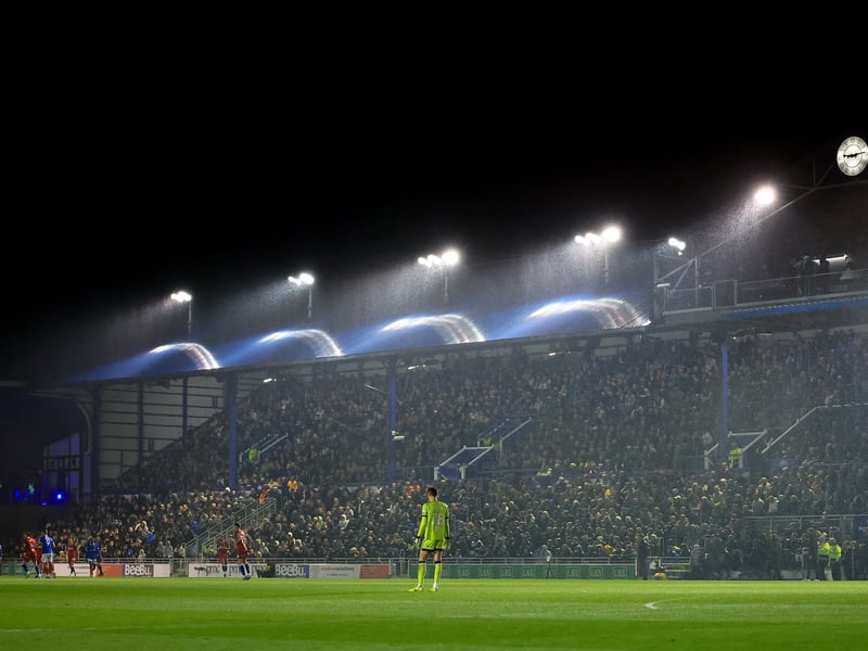Brilliant photos of jubilant Pompey faithful celebrating triumph over Ipswich Town under the lights at Fratton.