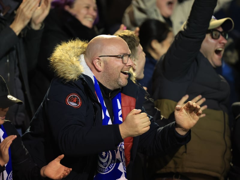 Brilliant photos of jubilant Pompey faithful celebrating triumph over Ipswich Town under the lights at Fratton.