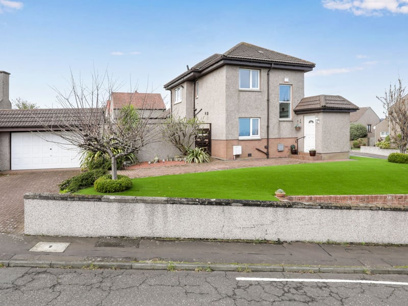 This detached house in the heart of Portobello comes with a good-sized driveway and double garage.