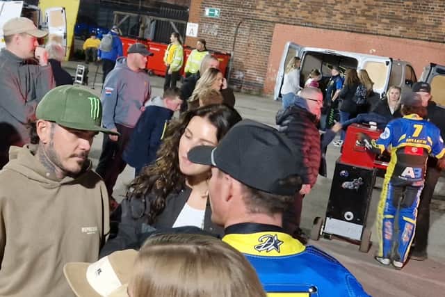 Former Sheffield rider and three time world champion Tai Woffinden talks to Sheffield skipper Josh Pickering at Owlerton after Tigers' meeting with Leicester. Photo: Iconic Media