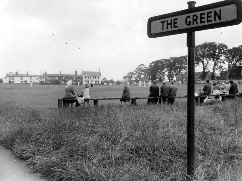A cricket match in progress on The Green in 1961.