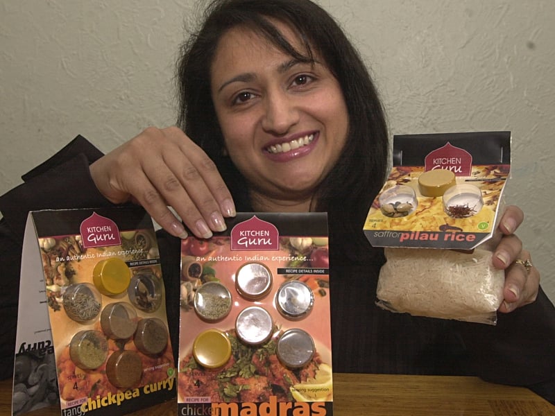 Entrepreneur Rekha Parmar pictured with her packeted individually pre-mixed spices in June 2002.