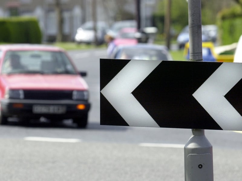 Signs on the roundabout at the top of Scott Hall Road were facing the wrong way in April 2002.