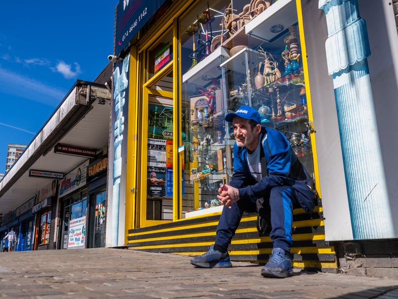 Neil Evers of Farnsley, taking a break in Armley Town Street.