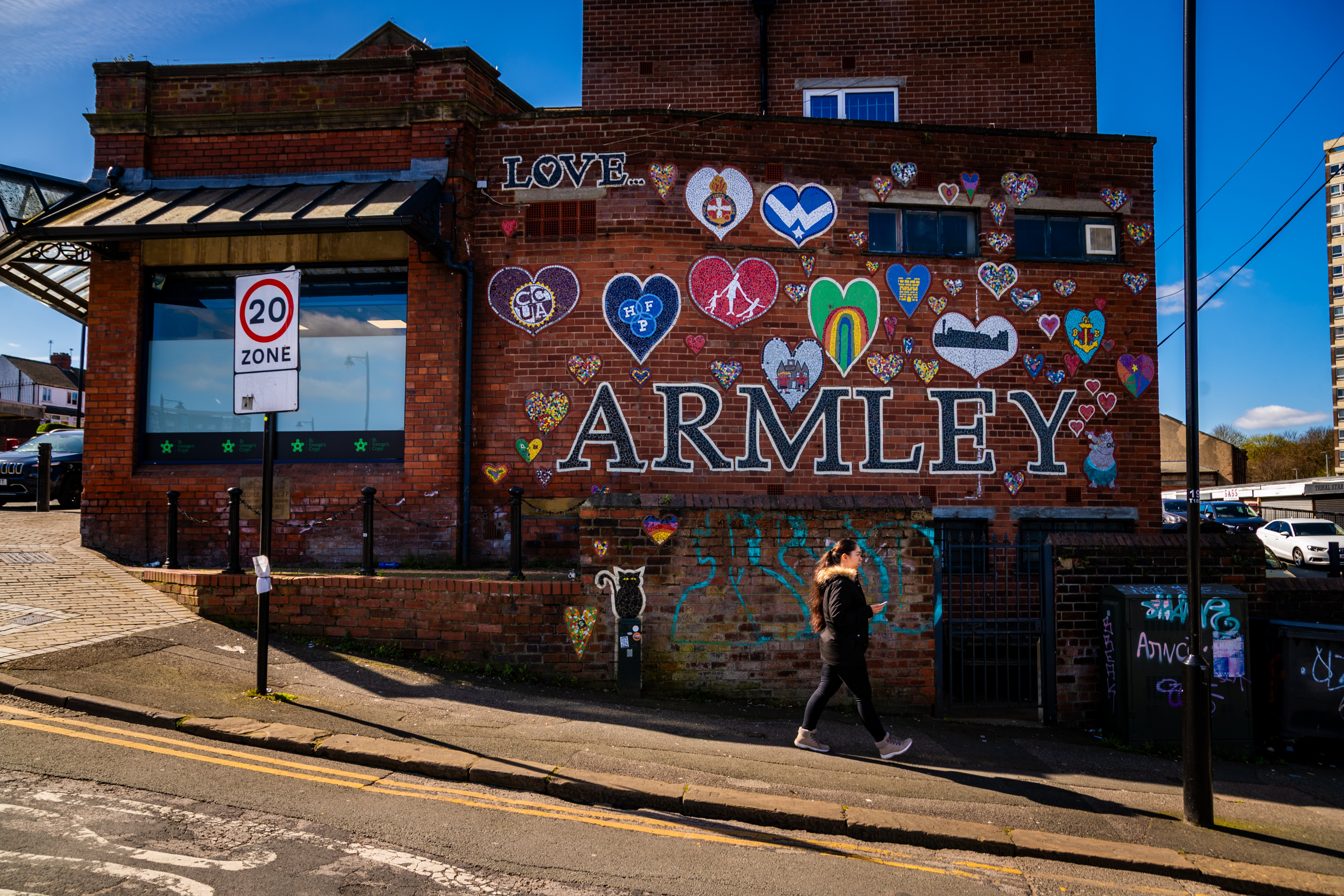 The Armley mural, housed on the side of St. George's Crypt on Town Street.
