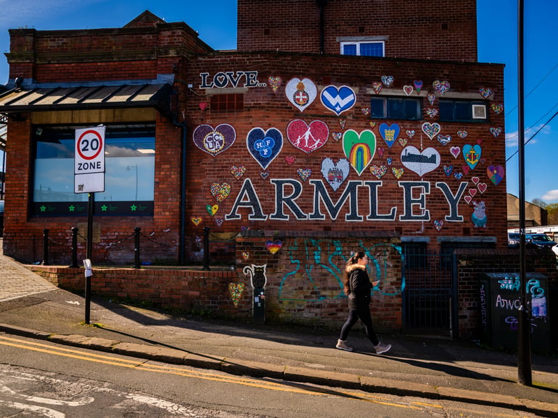 The Armley mural, housed on the side of St. George's Crypt on Town Street.