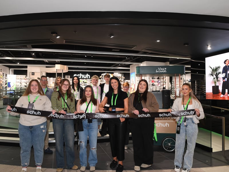 Liz Peacock and her team at the ribbon cutting ceremony.