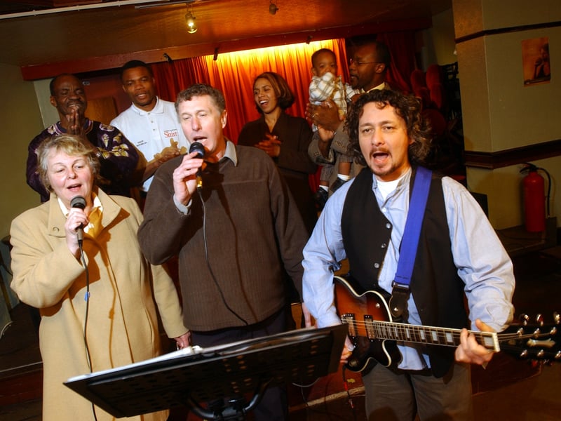 Sunday morning worship by the Dominion City Church at The Highwood Hotel in February 2003. Pictured, from left, are Brenda Burgess, Pastor Cherles Onasile, Istvan Allen, David Burgess, Marlene Chambers, 18 month-old Zaccai Chambers, Pastor John Chambers and Grant Marshall.