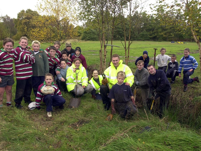Yorkshire Water employees joined players to clean-up club grounds after donating £2,500 to Moortown Junior Rugby Club in October 2002.