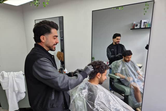 Barber Amir Aran has moved into one of the newly refurbished shop units on Devonshire Street, Sheffield. Photo: David Kessen, Iconic Media