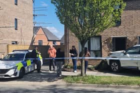 Police on the scene after a crash on Harborough Avenue, Manor. Photo: Iconic Media