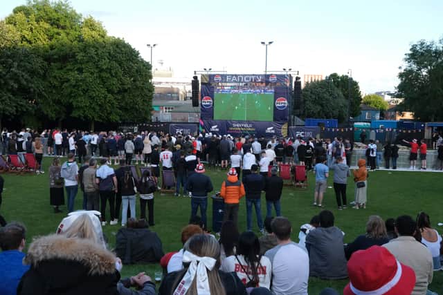England fans gather at FanCity in Devonshire Green, Sheffield to watch their opening game against Serbia