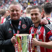 Chris Wilder and Billy Sharp celebrate promotion from League One in 2017.