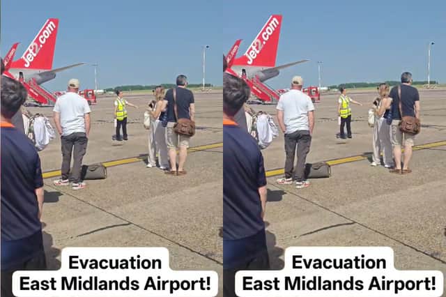 Passengers on the tarmac as East Midlands Airport is evacuated.