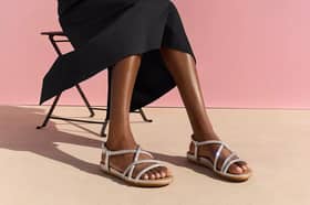 The FitFlop Gracie Crystal Strappy Back-Strap Sandals became my go-to holiday shoes thanks to their comfort and stylish design. Photo posed by model.