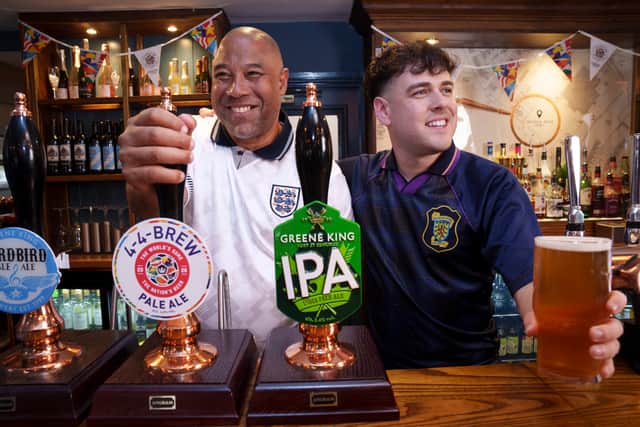 John Barnes (left) and internet personality Mark Thorburn join Greene King at The Endbutt Pub in Liverpool, as part of a campaign by the pub company encouraging fans to watch this summer's football tournament in the pub.  Jon Super/PA Media Assignments