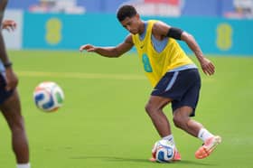 England midfielder Jude Bellingham controls the ball during a training session for the national soccer team in Palm Beach Gardens, Fla., Tuesday, June 2, 2026, ahead of the World Cup soccer tournament. (AP Photo/Rebecca Blackwell)